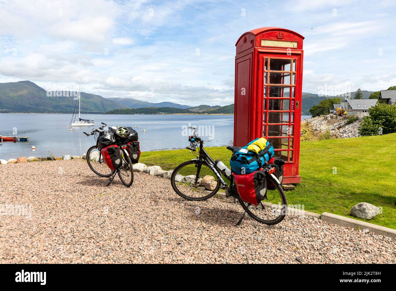 Scotland Caledonia way and national cycle route 78, cyclists have stopped at Holly tree hotel for rest on Loch Linnhe, Glencoe,summer 2022 Stock Photo