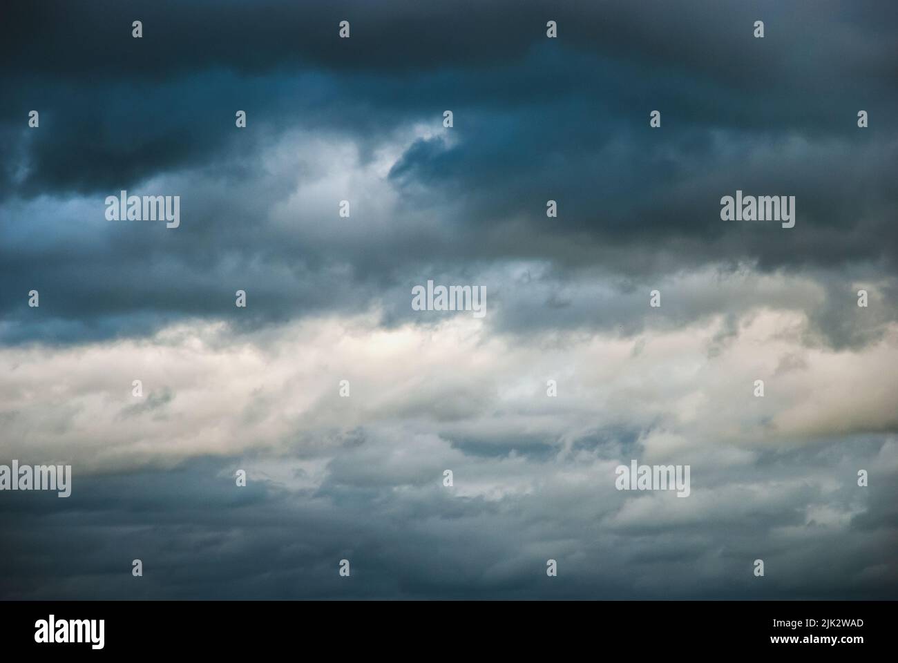 Dramatic moody sky, ominous cloudscape, thunderclouds in windy autumn sky Stock Photo