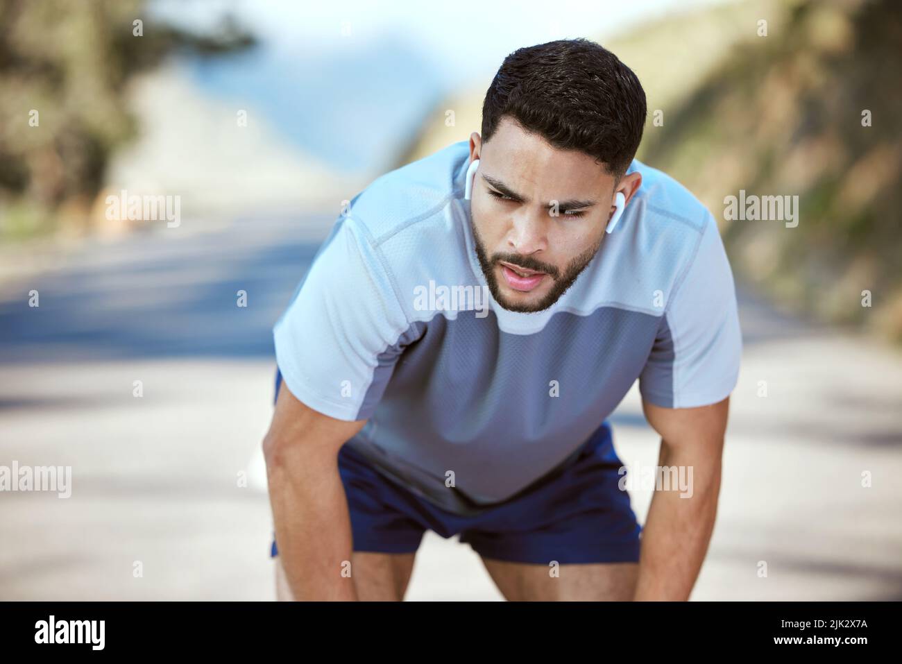 Sweat is the footprints towards a better you. a sporty young man