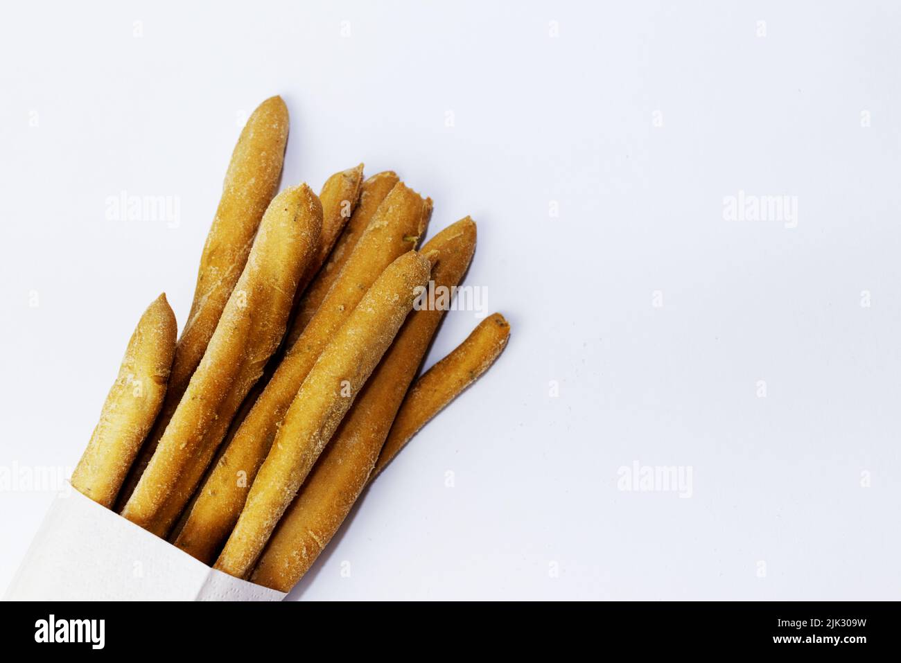 Italian grissini in a napkin on a white background Stock Photo Alamy