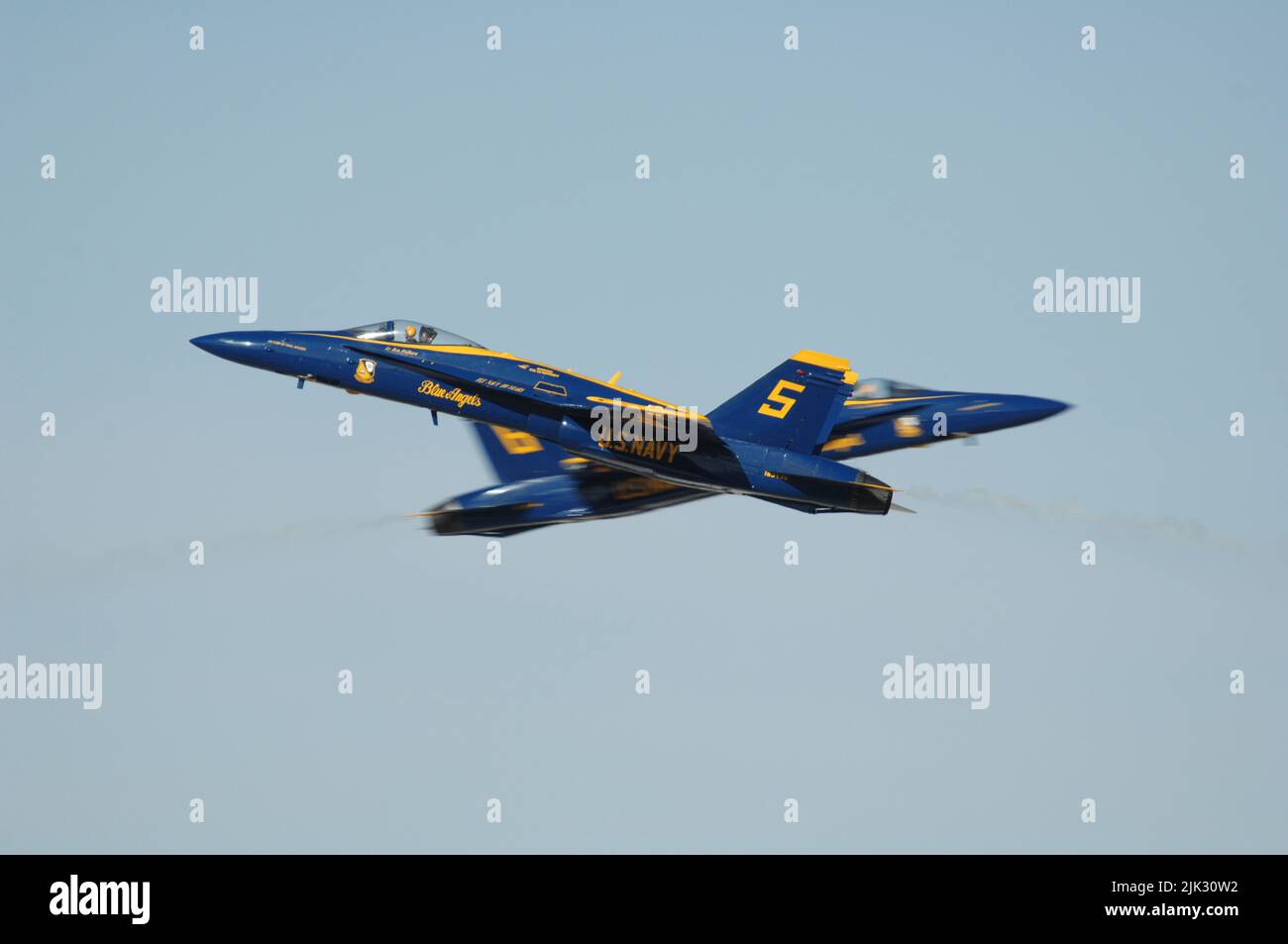 Blue Angel solos 5 and 6 cross at show center during the NAF El Centro Air Show Stock Photo