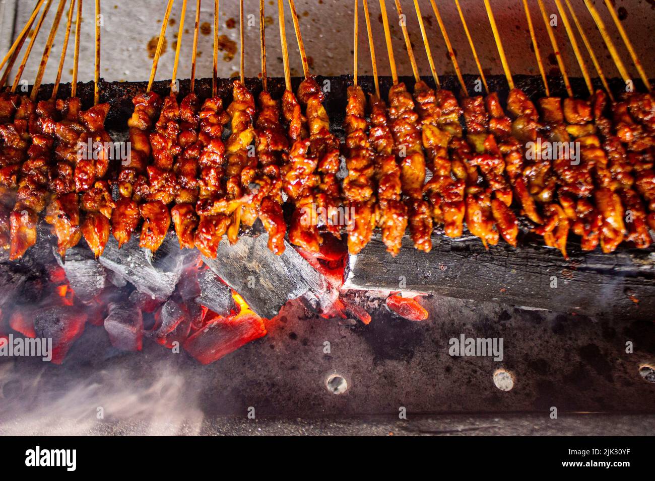 sate ayam or chicken satay , or chicken or meat satay with charcoal