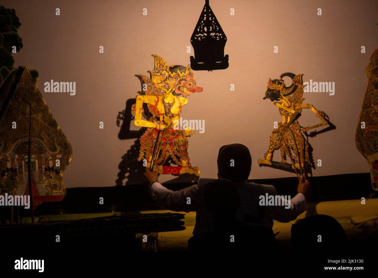 wayang kulit or shadow puppets from Java, Indonesia puppet show by dalang or puppeteer . Wayang made from leather Stock Photo