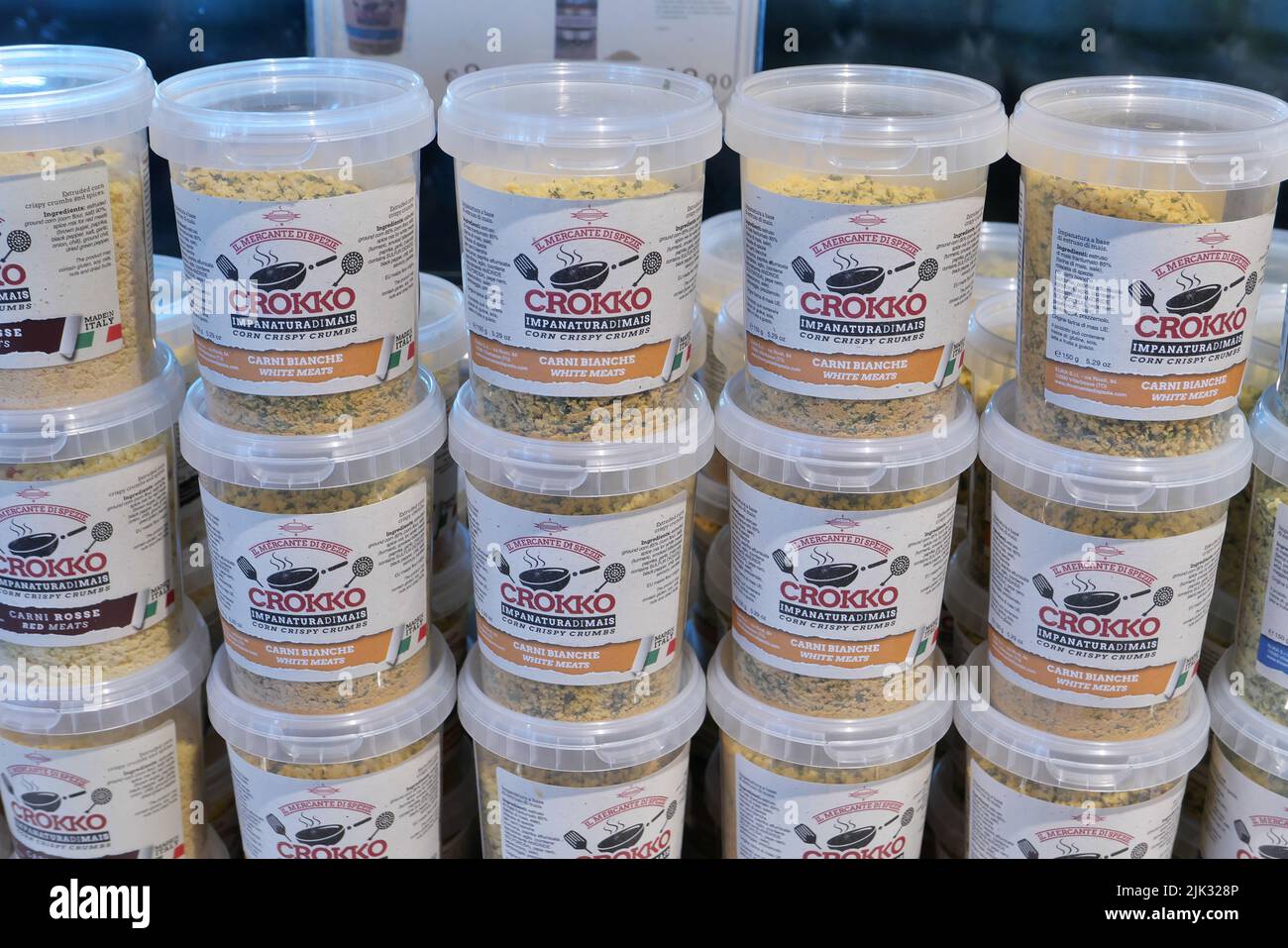 CROKKO PLASTIC TINS WITH CORN BREADING INSIDE THE EATALY FOOD STORE Stock Photo