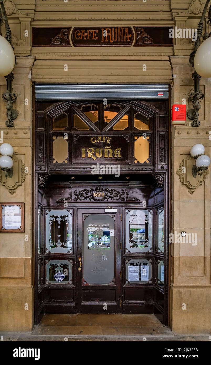 Pamplona, Spain - June 21, 2021: Ornate facade of historic coffee shop Iruna, frequented by Ernest Hemingway on Plaza del Castillo square in Old Town Stock Photo