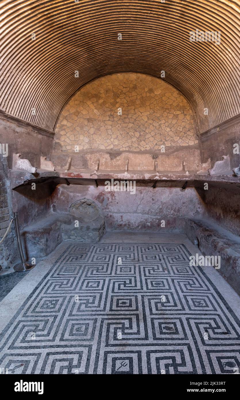 HERCULANEUM, ITALY - MAY 04, 2022 - Ancient ladys themral baths in the Roman city of Herculaneum, Italy Stock Photo