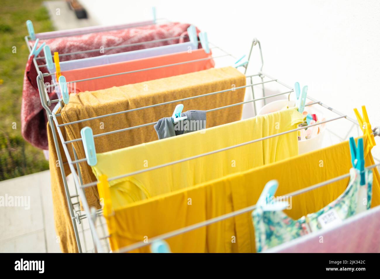fresh clean white sheet drying on washing line in outdoor Stock Photo