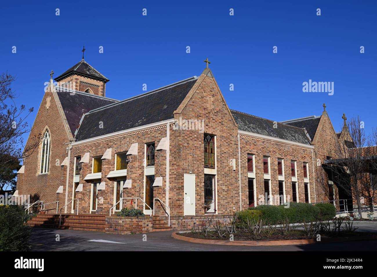 Exterior of St Finbar's Catholic Church, located on Centre Rd, during a sunny day Stock Photo