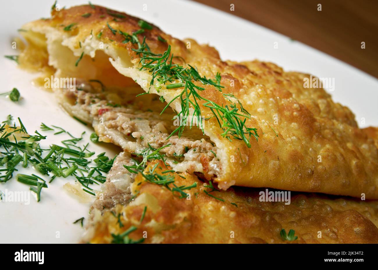 Tunisian Brik -north African version of borek, a stuffed filo pastry which is commonly deep fried. Stock Photo