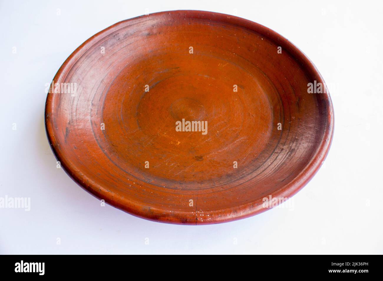 earthenware plate isolated on white background. earthenware crafts