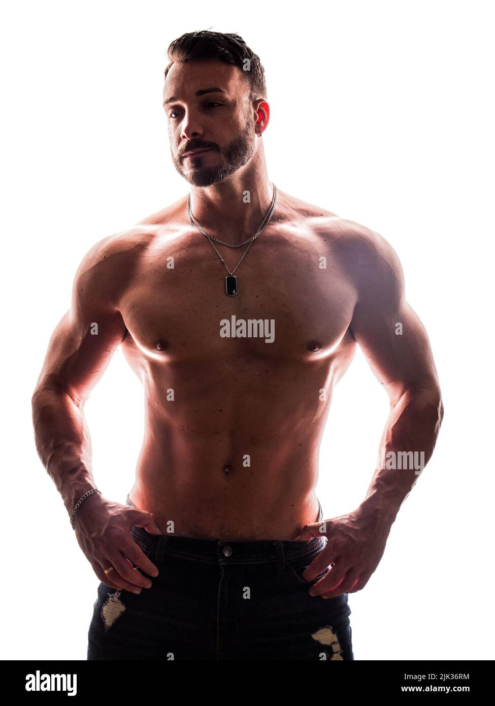 Shirtless muscular male bodybuilder in studio shot on white Stock Photo