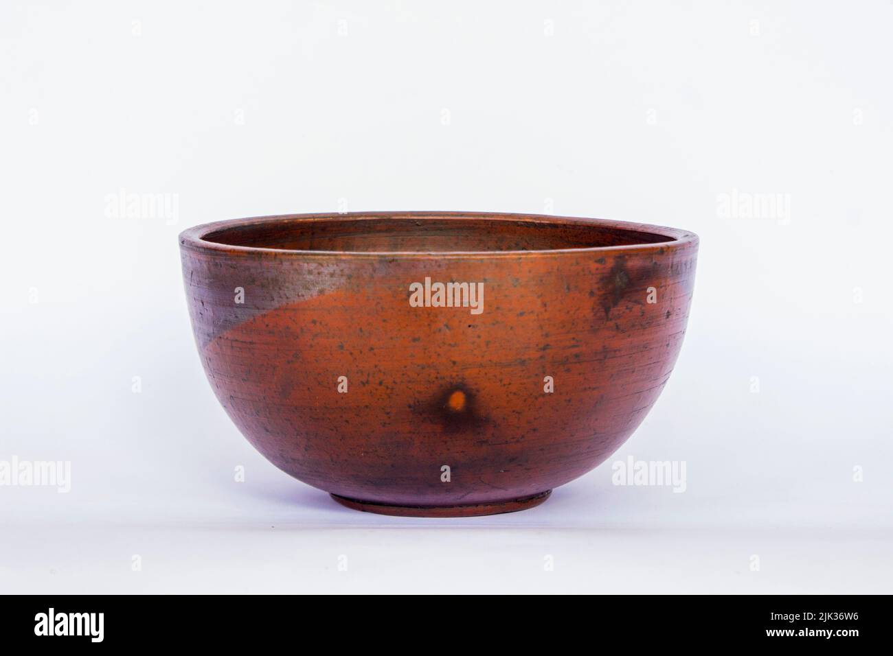 earthenware bowl isolated on white background. earthenware crafts Stock