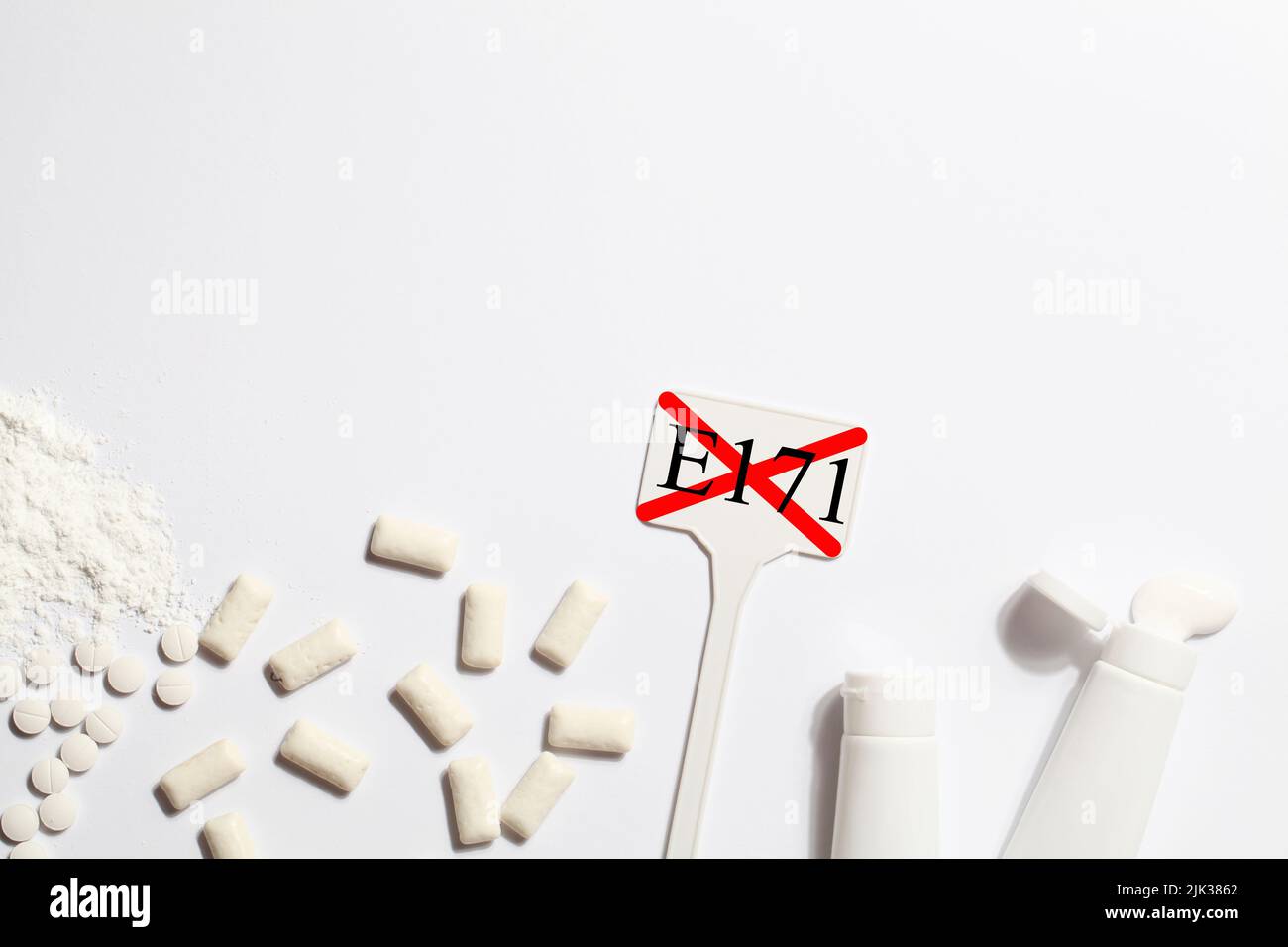 Titanium dioxide, E171, dangerous additive concept. gum, pills ...