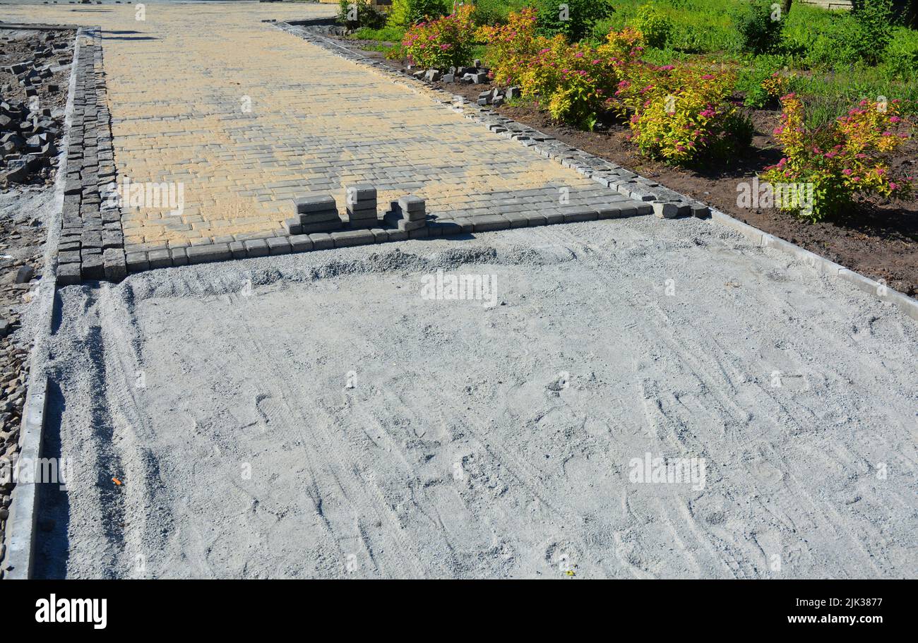 Paver walkway, pathway installation and building A closeup of