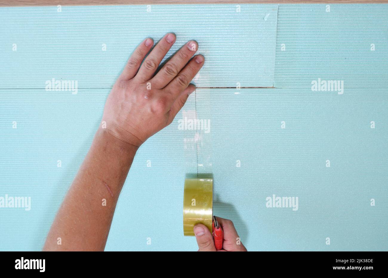 Installing soundproofing underlayment, soundproofing insulation on a