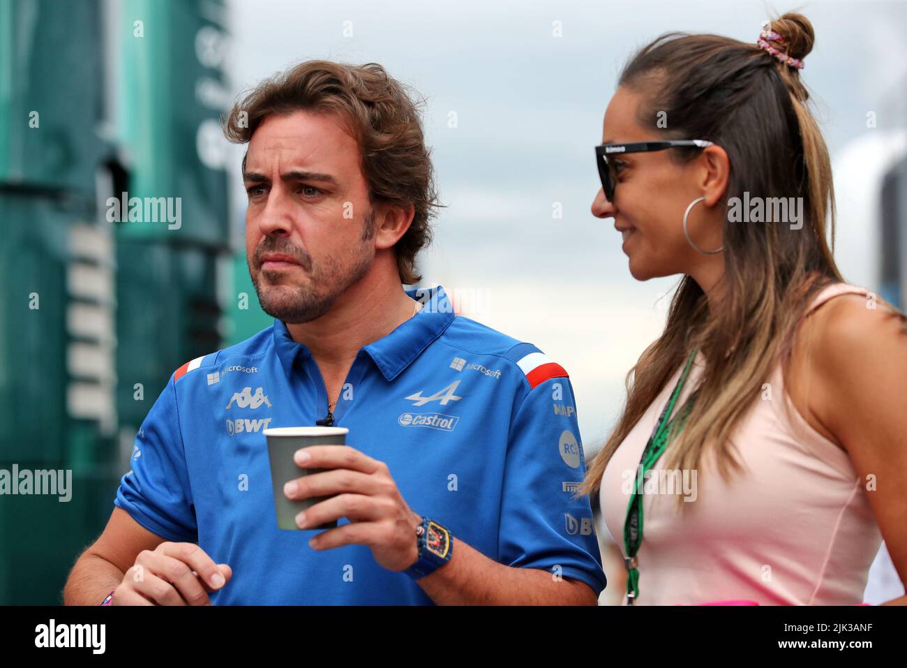 Mogyorod, Hungary. 30th July, 2022. (L to R): Fernando Alonso (ESP) Alpine F1 Team with his girlfriend Andrea Schlager (AUT) Journalist. Hungarian Grand Prix, Saturday 30th July 2022. Budapest, Hungary. Credit: James Moy/Alamy Live News Stock Photo