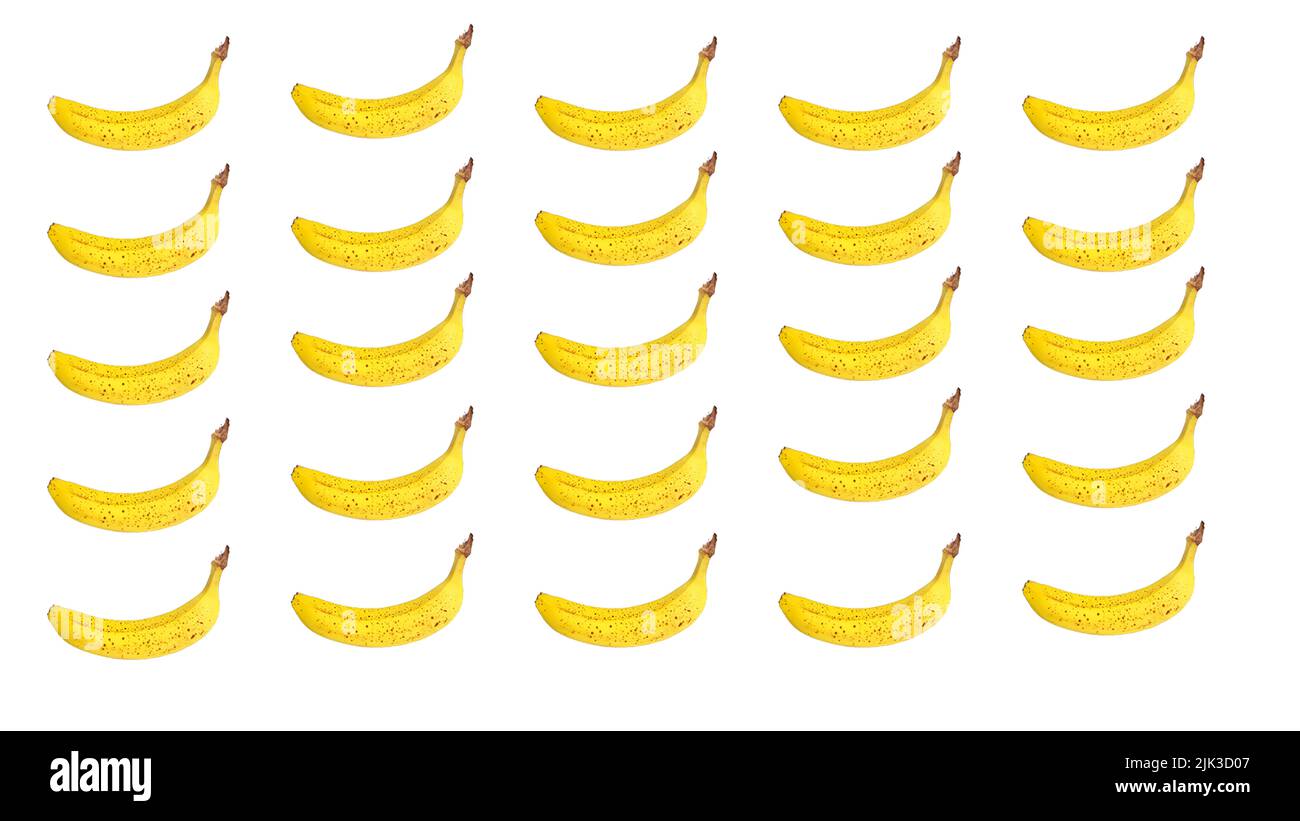 Colorful fruit pattern of fresh yellow bananas on white background. From the top view. Raw fruit idea concept. No people, nobody. Above. Up. Stock Photo