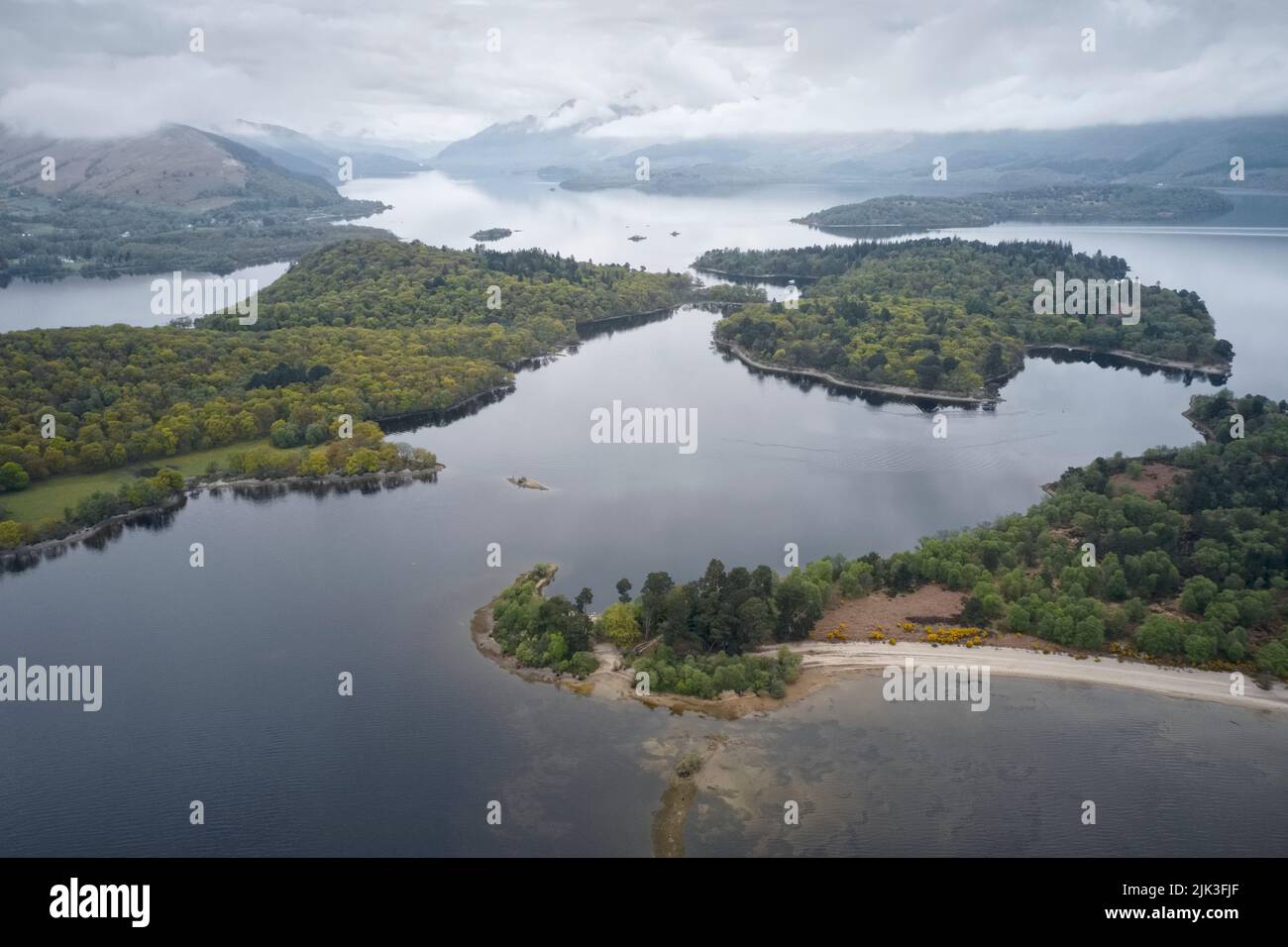 Loch Lomond aerial view showing islands Inchtavannach, Inchconnachan, Inchcruin and Inchfad Stock Photo