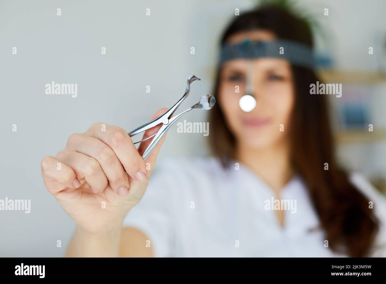 Instruments ENT doctor closeup with hand. Therapist. Female ENT doctor