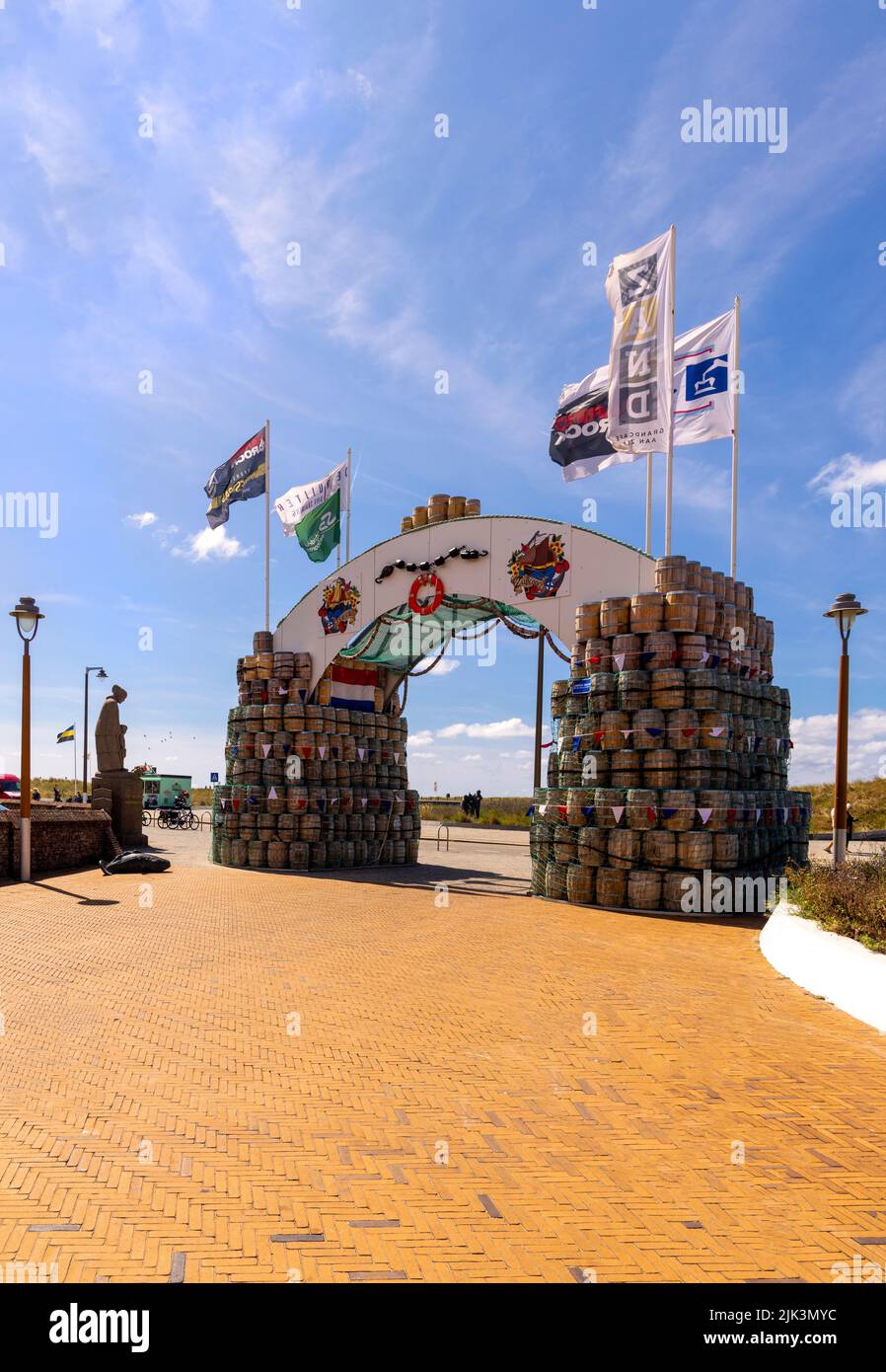 The Arch of Honour ( stacked herring barrels and nets), a decorative and traditional feature in summer season, Katwijk, South Holland, Netherlands. Stock Photo