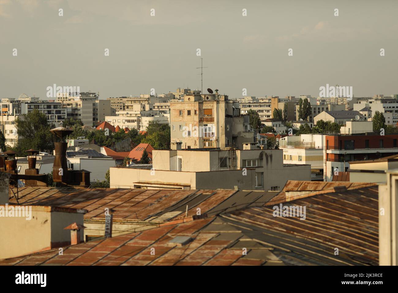 Bucharest, Romania - July 30, 2022: Old part of Bucharest during a summer sunset with many old and ruined buildings. Stock Photo