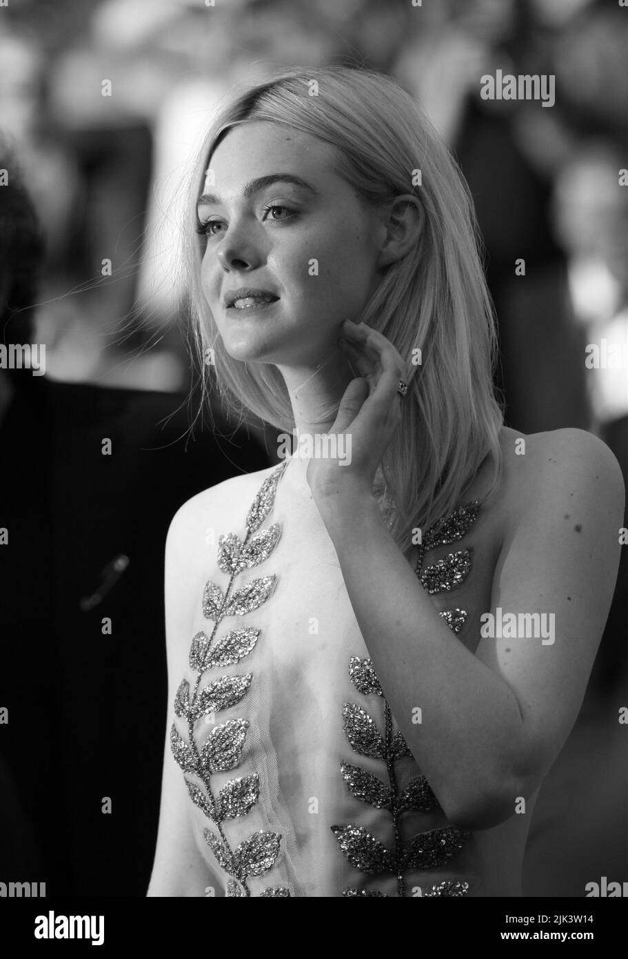 Actress Elle Fanning departs after the How To Talk To Girls At Parties screening during the 70th annual Cannes Film Festival at Palais des Festivals on May 21, 2017 in Cannes, France. Stock Photo