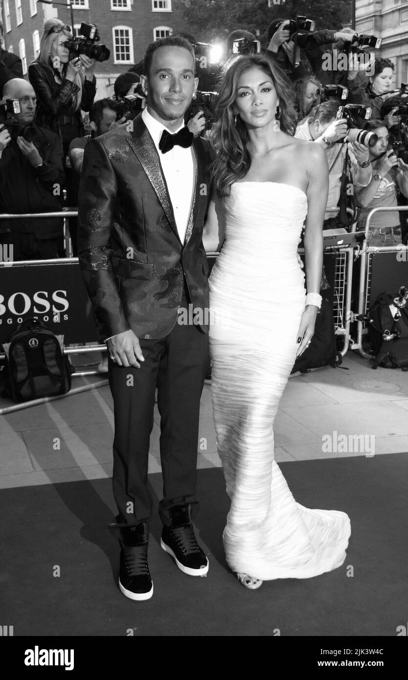 London, UK, 2nd September 2014: Lewis Hamilton and Nicole Scherzinger attend the GQ Men of the Year awards at The Royal Opera House in London, UK. Stock Photo