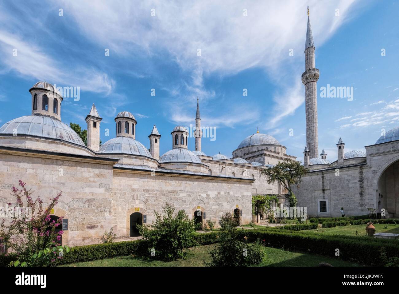 Edirne, Turkey - October 2021:View from courtyard of Ancient Ottoman hospitalwith cloudy blue sky, Complex of Sultan Bayezid II. Housing Medical Museu Stock Photo