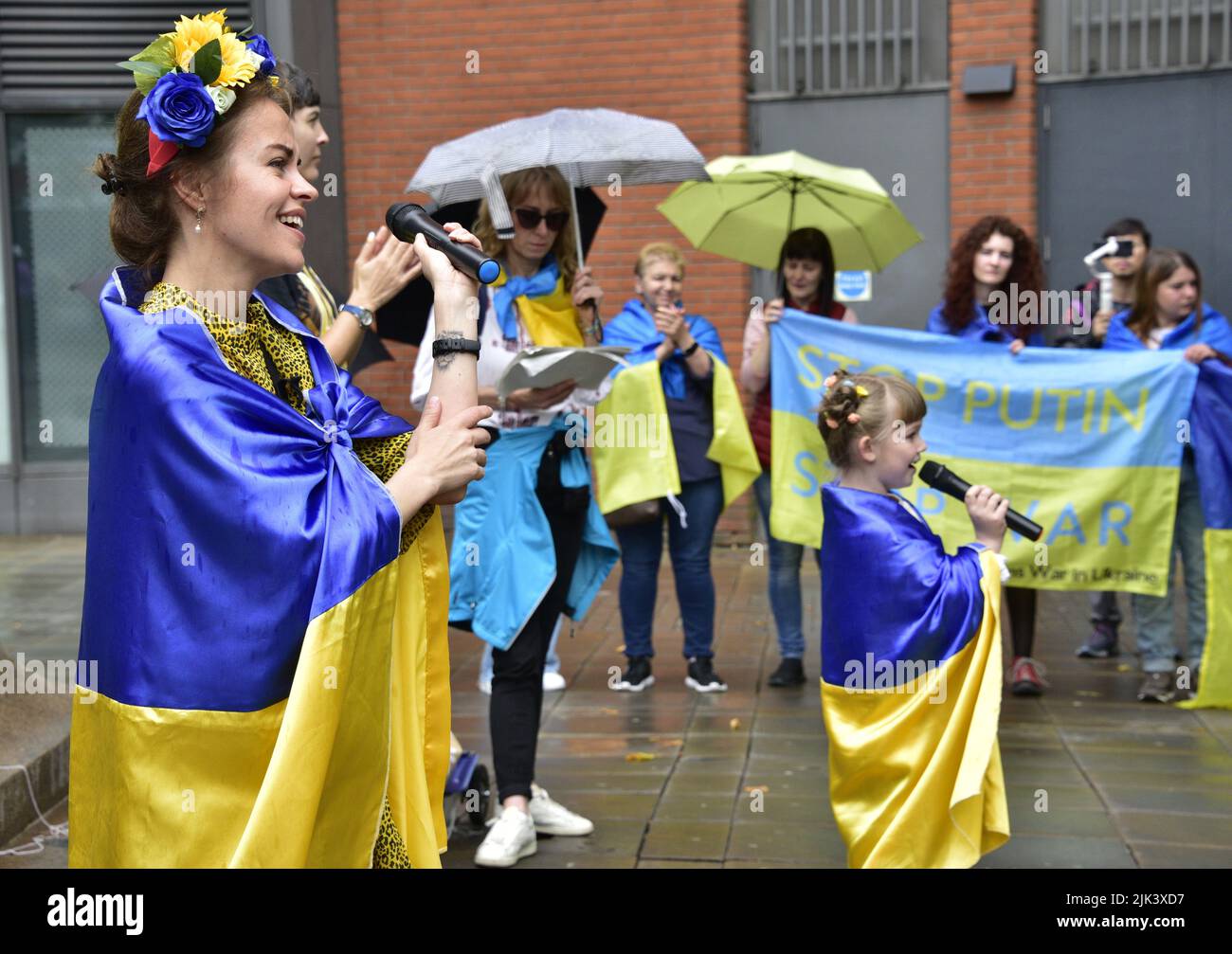 Manchester, UK, 30th July, 2022. “Stand with Ukraine” anti-war rally, a protest about the Russian invasion of Ukraine in Piccadilly Gardens, central Manchester, England, United Kingdom, British Isles. The protests are organised by the Ukrainian Cultural Centre, Manchester. Credit: Terry Waller/Alamy Live News Stock Photo