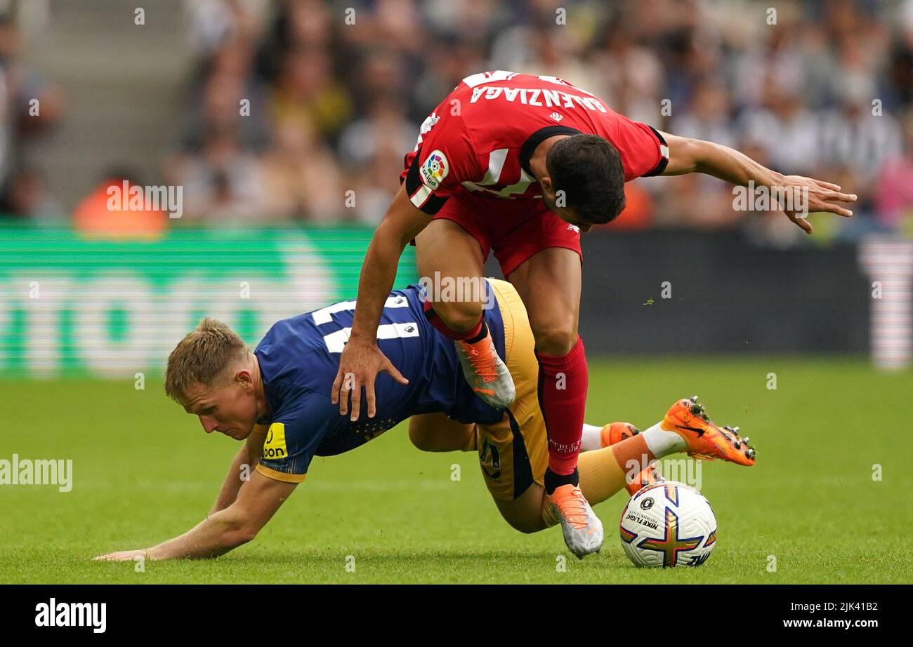 Newcastle United's Matt Ritchie (left) and Athletic Bilbao's Mikael Balenziaga battle for the ball during the pre-season friendly match at St. James' Park, Newcastle upon Tyne. Picture date: Saturday July 30, 2022. Stock Photo