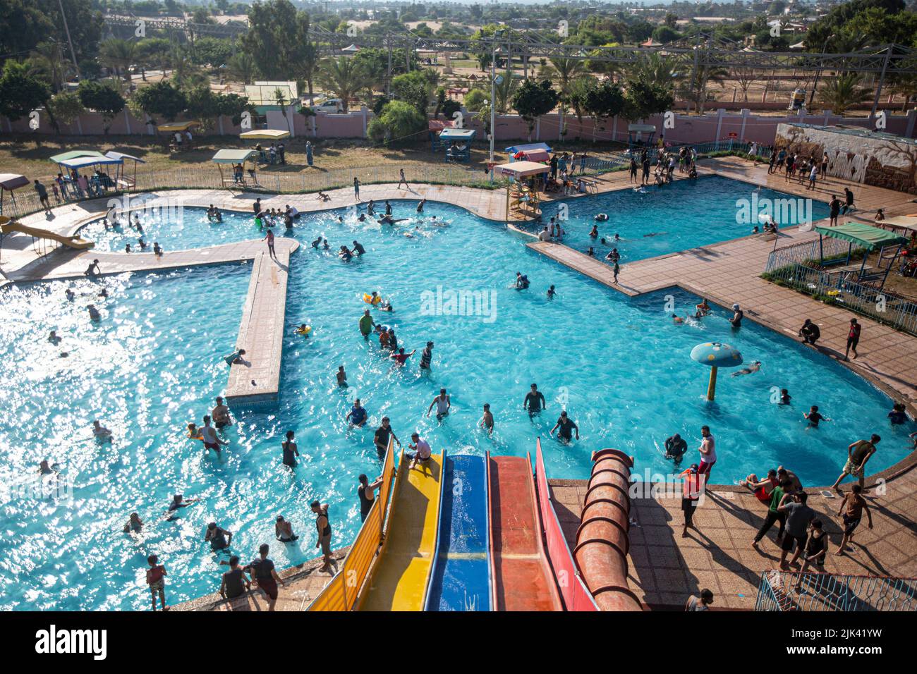 gaza-palestine-30th-july-2022-palestinians-swim-in-a-swimming-pool-as-they-cool-off-during-a-hot-day-in-the-city-of-khan-yunis-in-the-southern-gaza-strip-photo-by-yousef-masoudsopa-imagessipa-usa-credit-sipa-usaalamy-live-news-2JK41YW.jpg