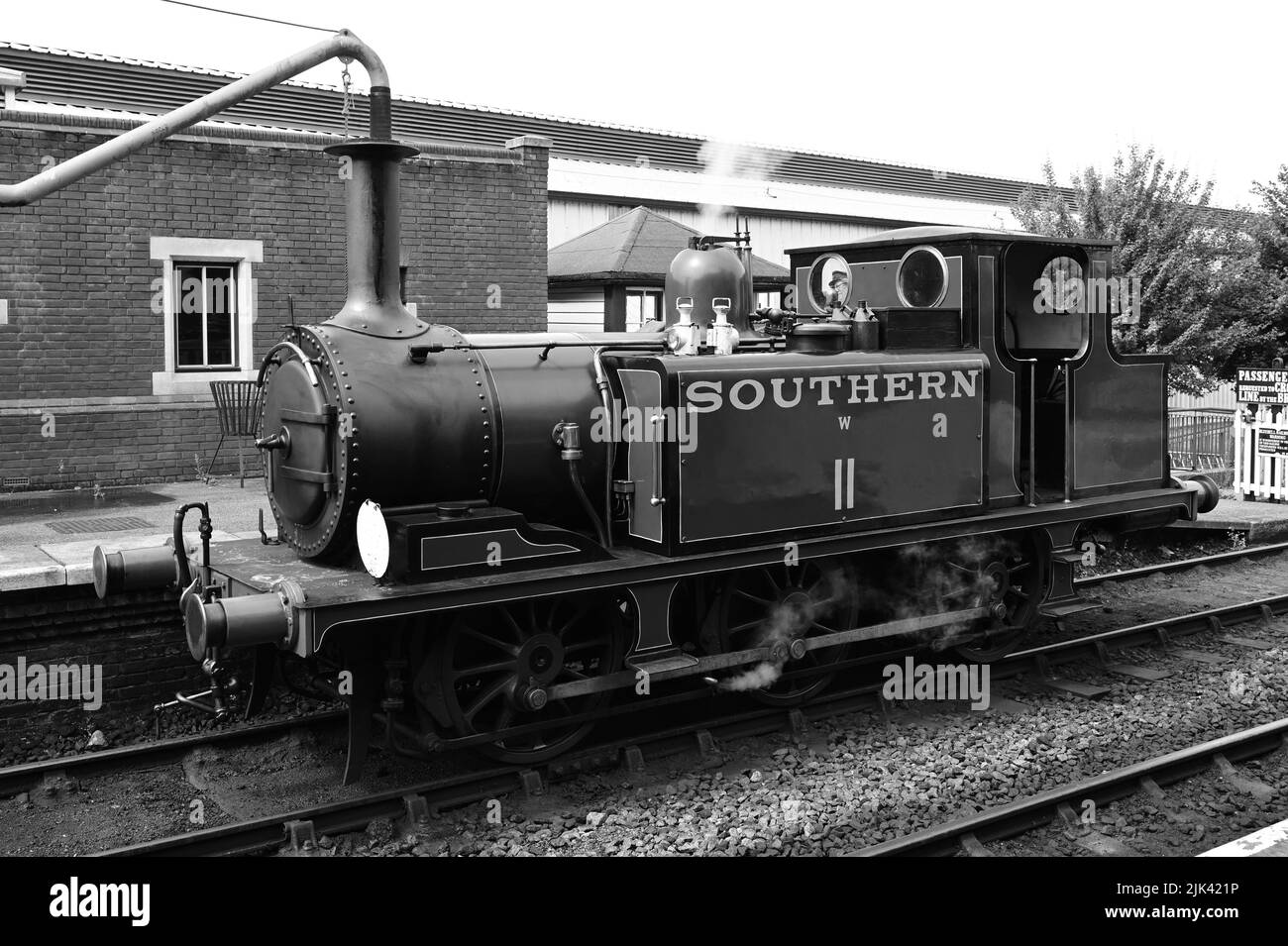 Sheffield Park, East Sussex, UK-July 30th 2022: A LB SCR A1 class Terrier locomotive refueling with water at Sheffield Park station. Stock Photo