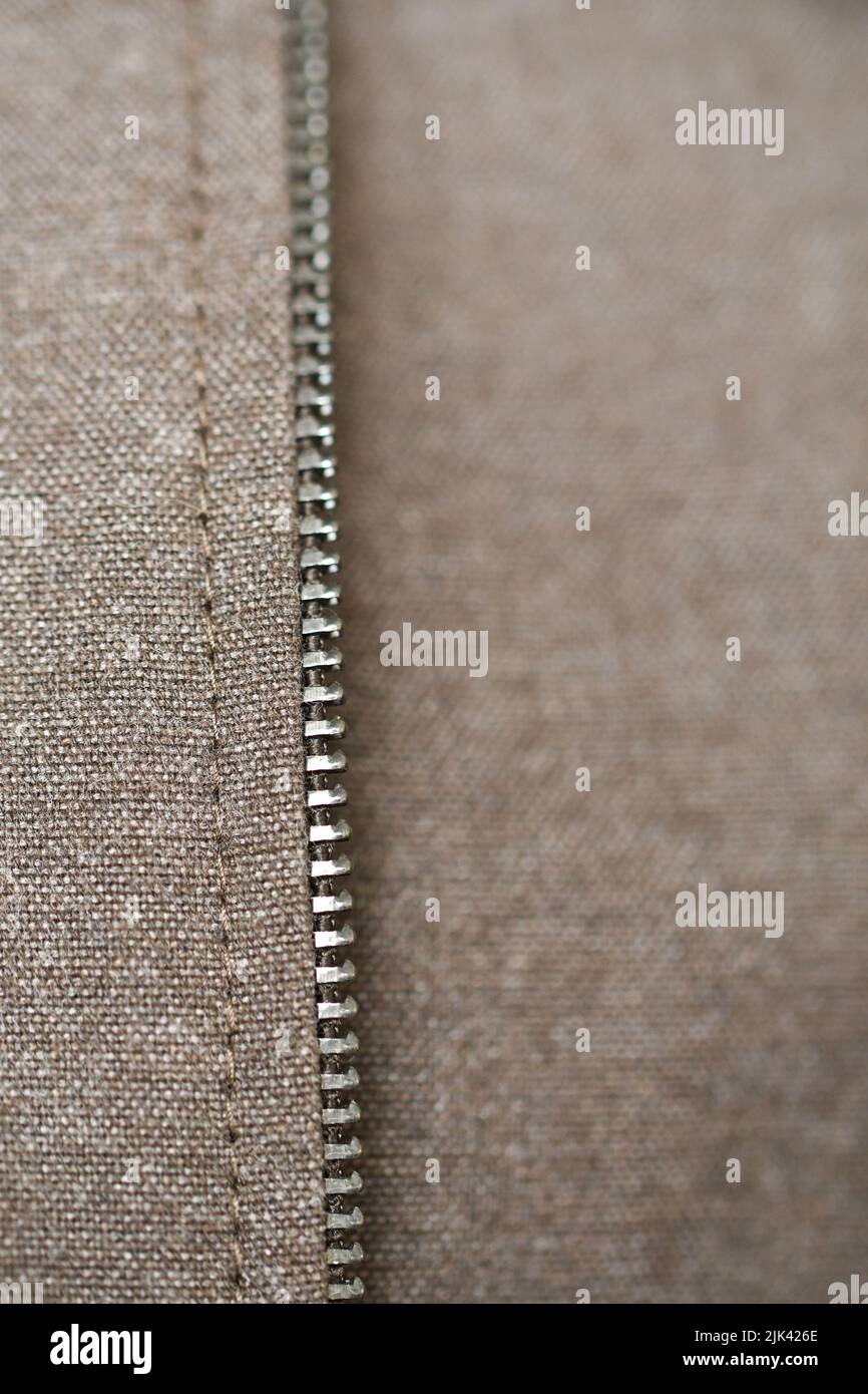 Closeup or macro of zipper of a brown jacket Stock Photo