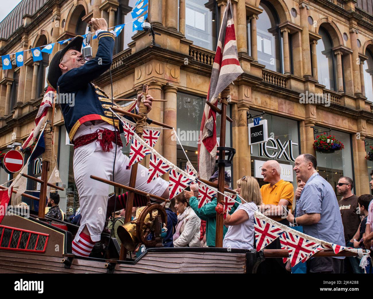 Harrogate, 30th July 2022. The Harrogate Carnival is taking place today under gloomy skies. Captain Poopdeck Porter performing on board HMS Punafore. Picture Credit: ernesto rogata/Alamy Live News Stock Photo