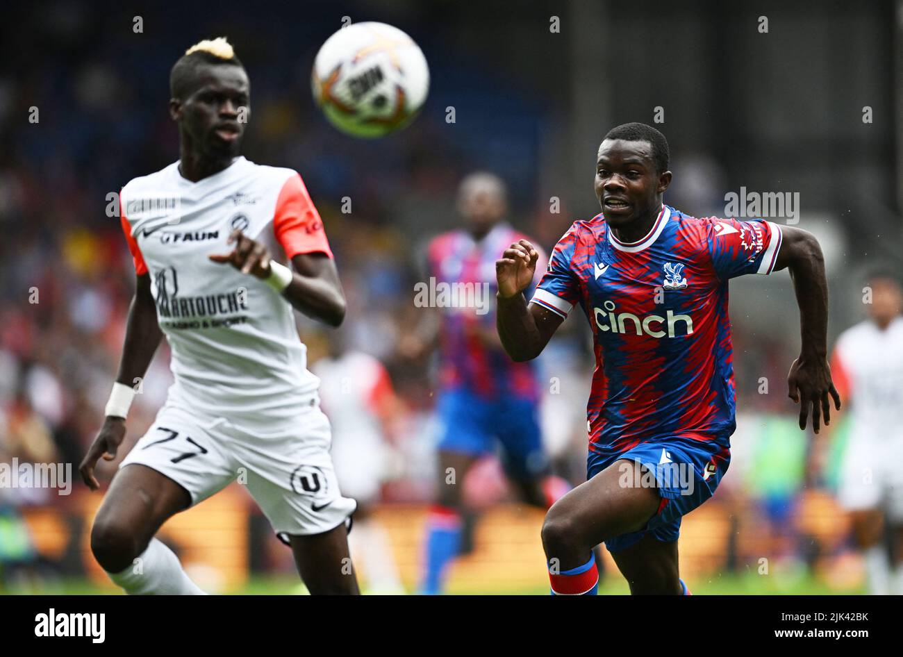 Soccer Football - Pre Season Friendly - Crystal Palace v Montpellier - Selhurst Park, London, Britain - July 30, 2022 Montpellier's Falaye Sacko in action with Crystal Palace's Tyrick Mitchell REUTERS/Dylan Martinez Stock Photo