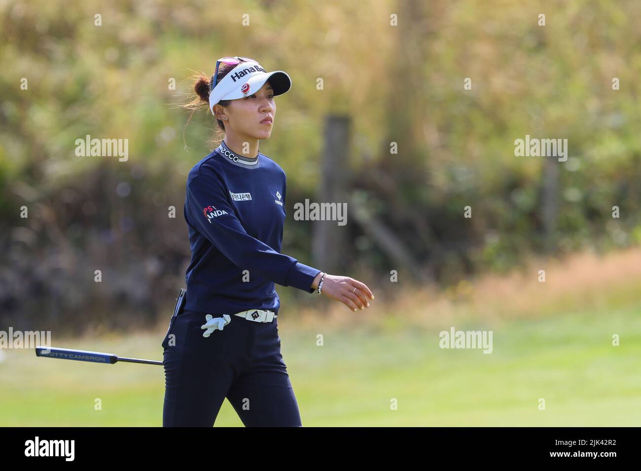 Irvine, UK. 30th July, 2022. The third round of the Trust Golf Women's Scottish Golf took place with 75 players making the cut. Heavy overnight rain from Friday into Saturday made for a softer and more testing course. Lidia Ko walking towards the 13th putting green. Credit: Findlay/Alamy Live News Stock Photo