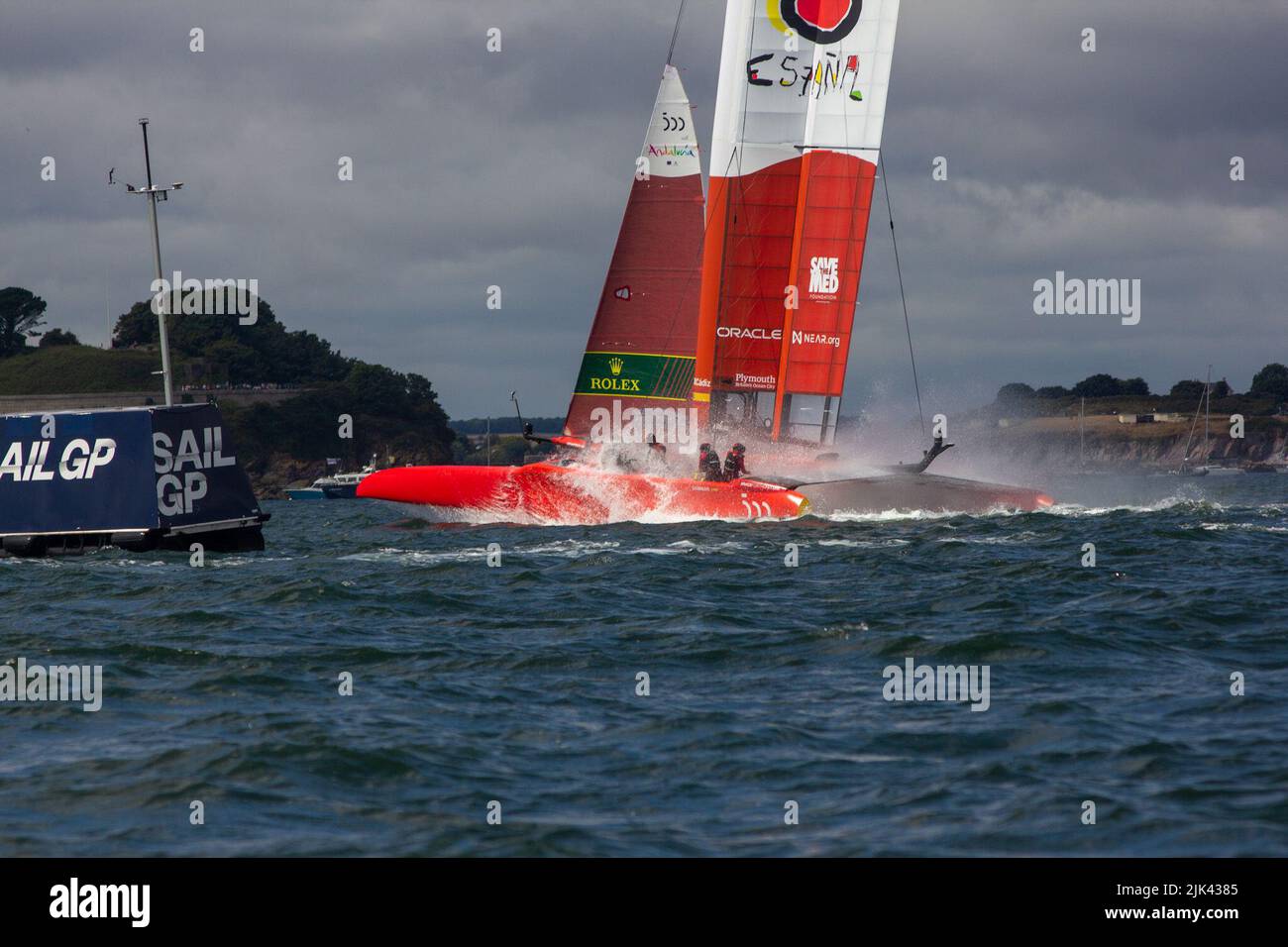 SailGP, Plymouth, UK. 30th July, 2022. Spain Dives into the water! Day 1 for the Great British Sail Grand Prix, as Britain's Ocean City hosts the third event of Season 3 as the most competitive racing on water. The event returns to Plymouth on 30-31 July. Credit: Julian Kemp/Alamy Live News Stock Photo