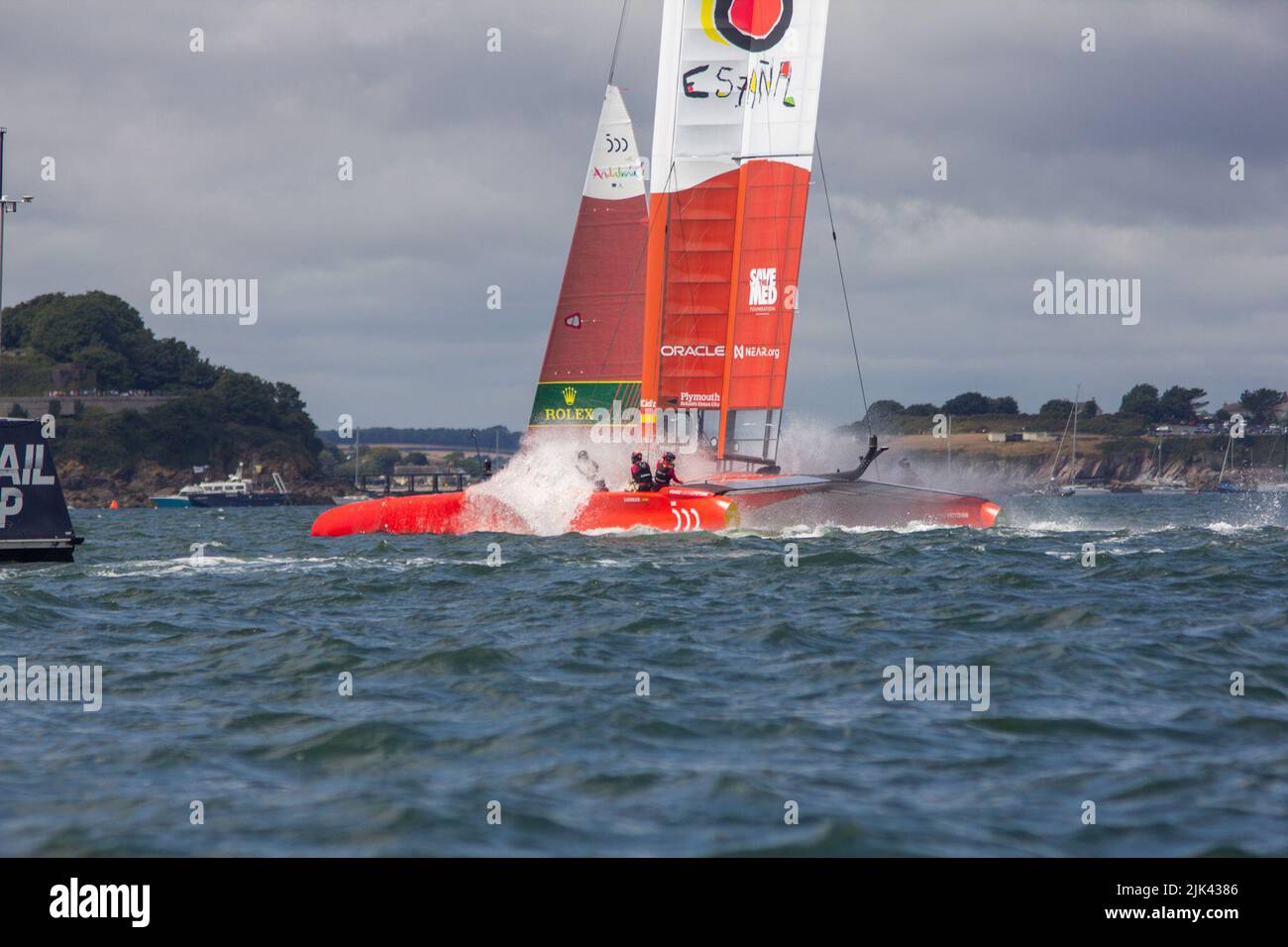 SailGP, Plymouth, UK. 30th July, 2022. Spain Dives into the water! Day 1 for the Great British Sail Grand Prix, as Britain's Ocean City hosts the third event of Season 3 as the most competitive racing on water. The event returns to Plymouth on 30-31 July. Credit: Julian Kemp/Alamy Live News Stock Photo