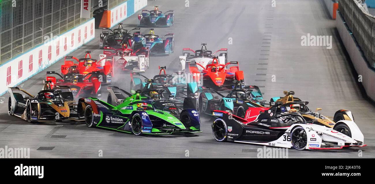 Cars approach turn one following the start of the 2022 SABIC London E-Prix at the ExCel Circuit, London. Picture date: Saturday July 30, 2022. Stock Photo