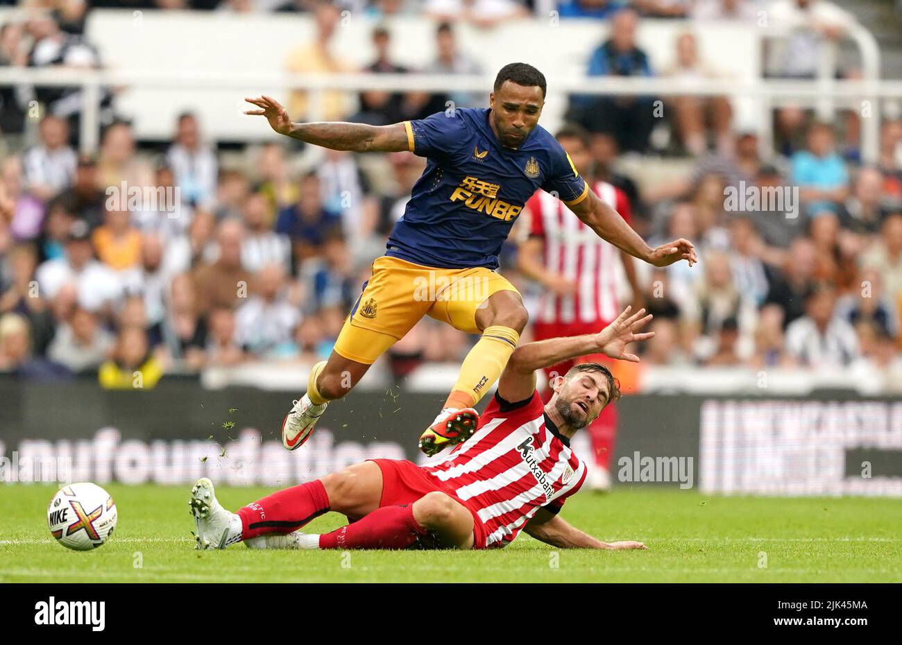 Newcastle United's Callum Wilson (top) Athletic Bilbao's Yeray Alvaraz battle for the ball during the pre-season friendly match at St. James' Park, Newcastle upon Tyne. Picture date: Saturday July 30, 2022. Stock Photo