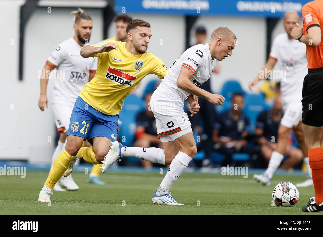 Westerlo's Erdon Daci and OHL's Casper De Norre fight for the ball