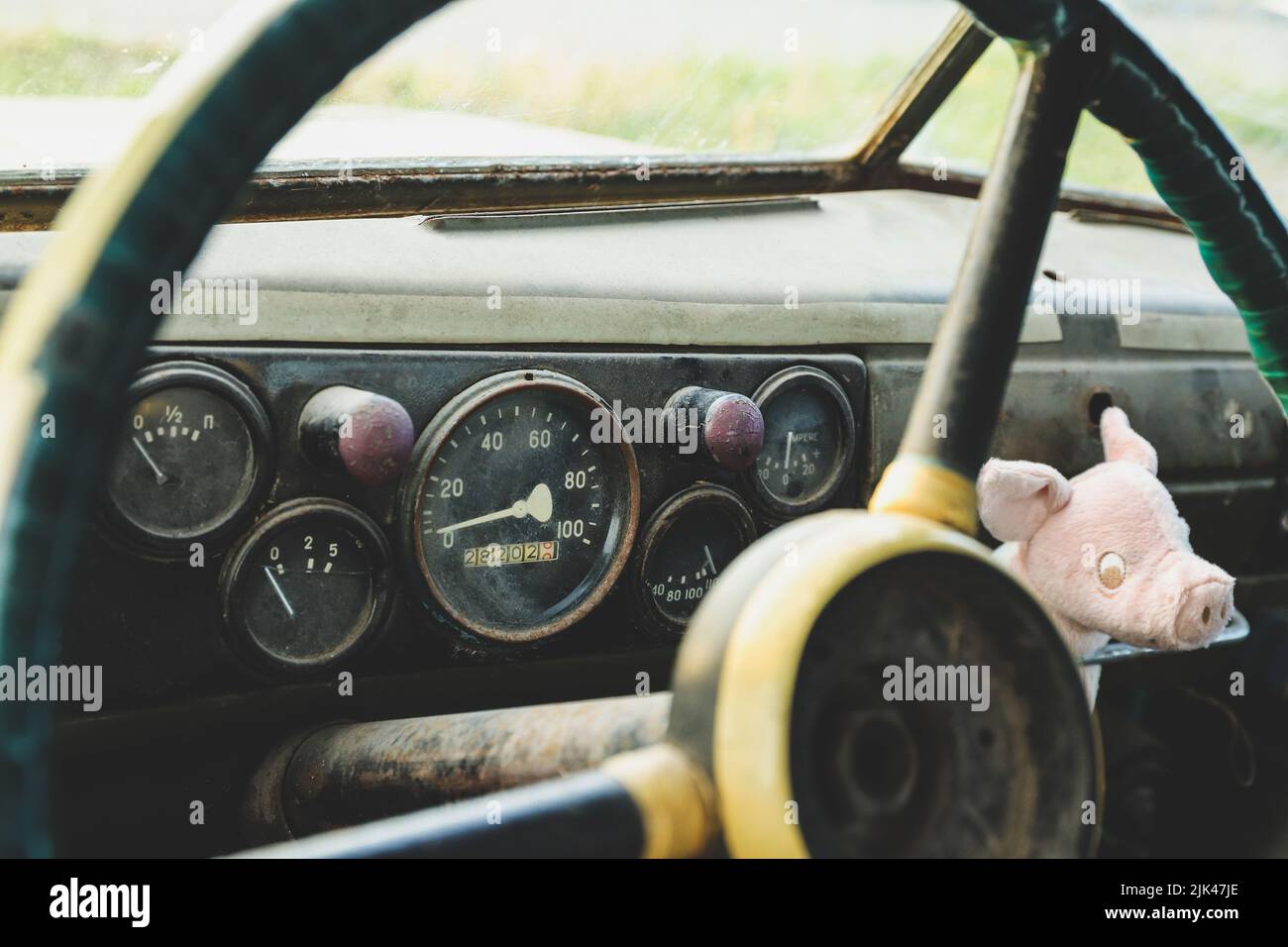 The dashboard in an old car close-up. Speedometer and gauges Stock Photo