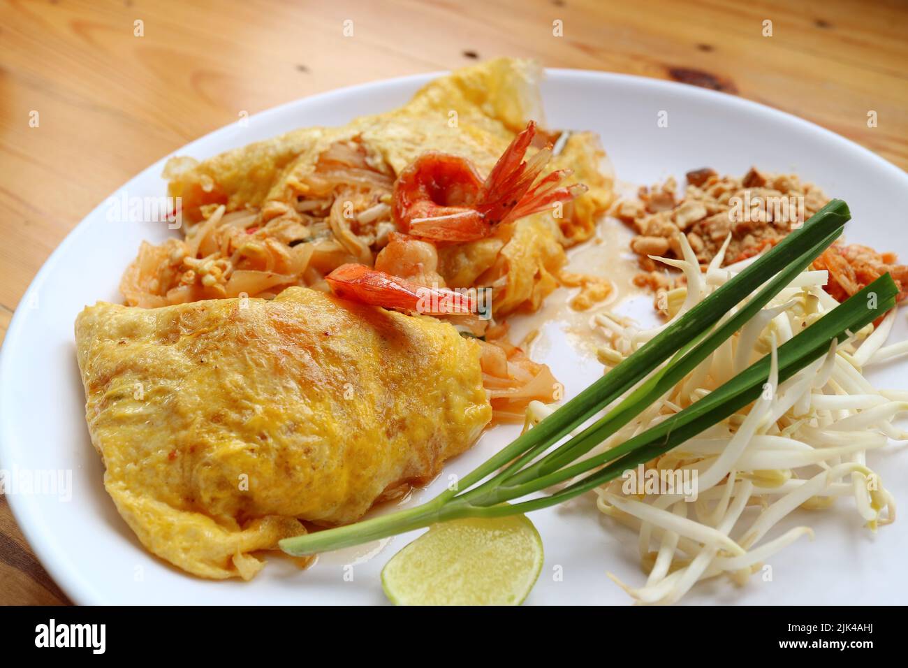 Delectable Thai Style Fried Noodle Called Pad Thai Wrapped in Fried Egg