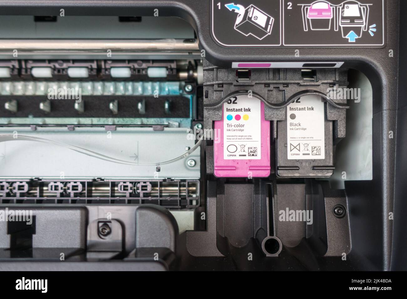 HP ink cartridge installed in printer Stock Photo