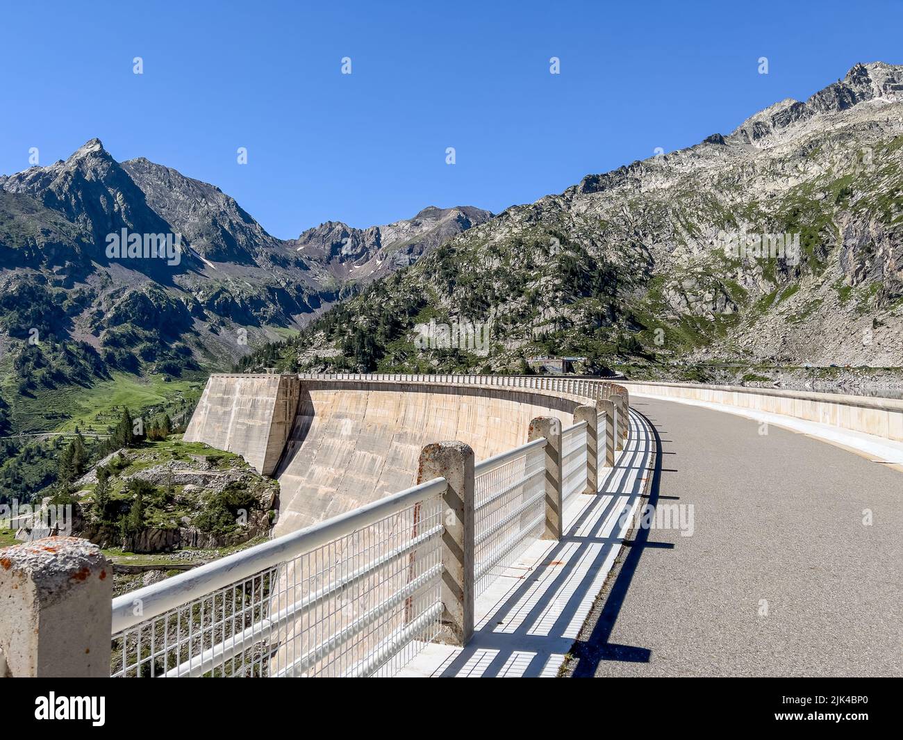 Barrage (Dam) Lac de Cap-de-Long reservoir high amongst Pyrenees mountains in France Stock Photo
