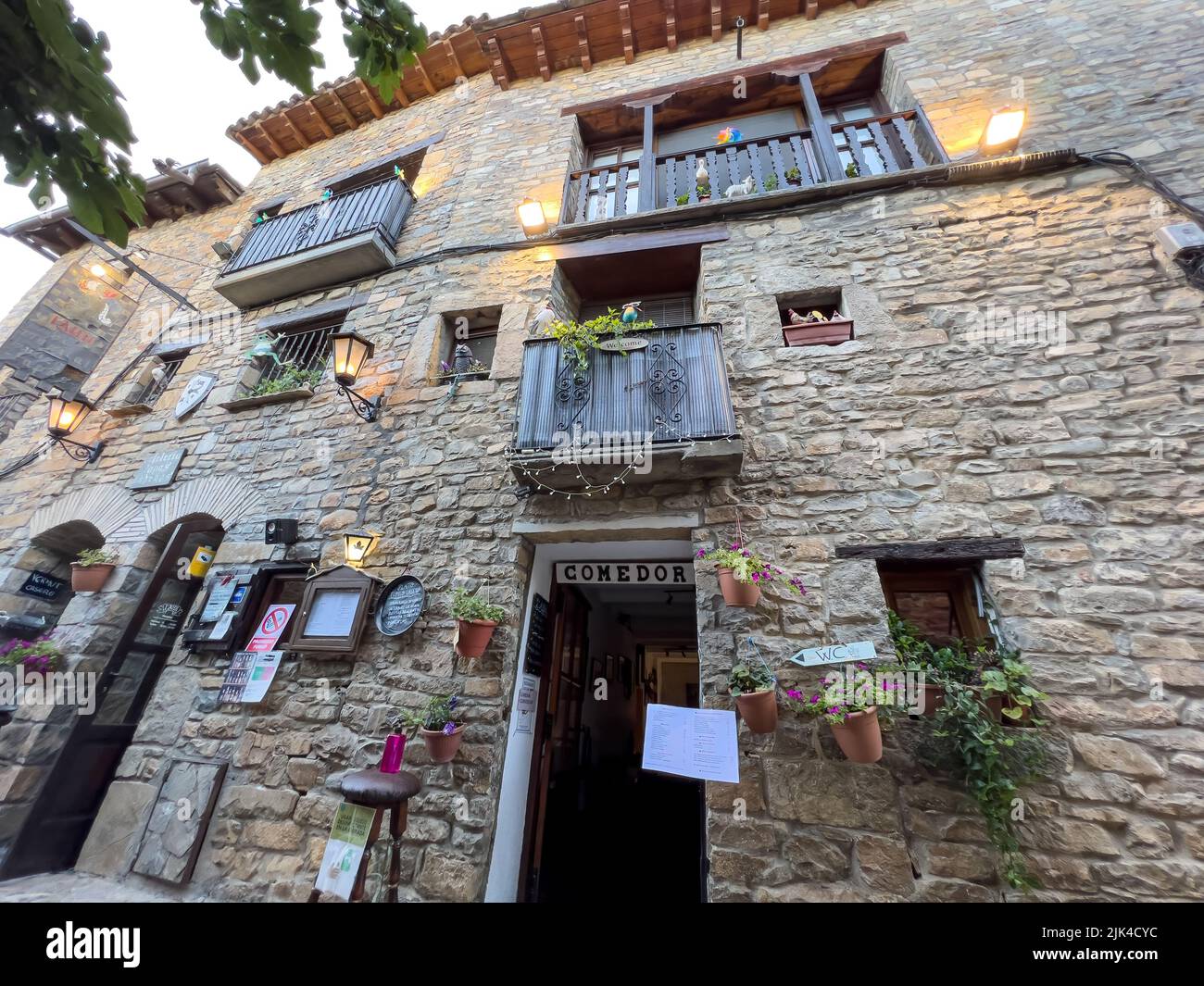 a side street restaurant in the medieval town of Ainsa Spain Stock Photo