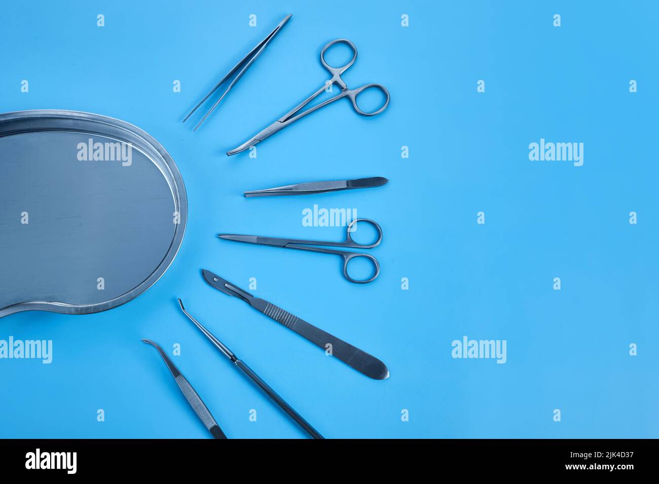 surgical equipment at surgery desk. Medical tools such scissors, scalpel. Stock Photo