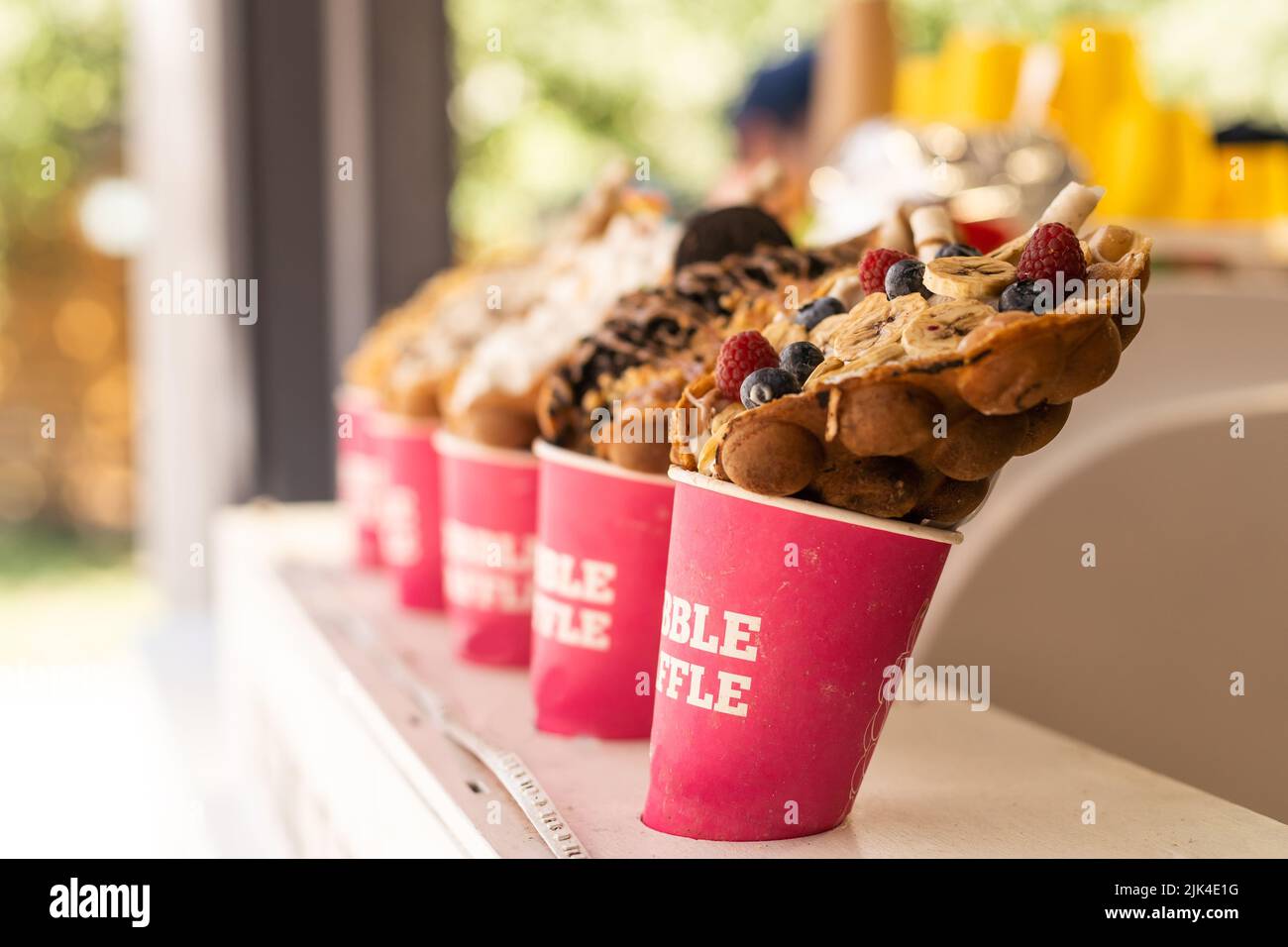 Different types of bubble waffle ice cream to go Stock Photo Alamy