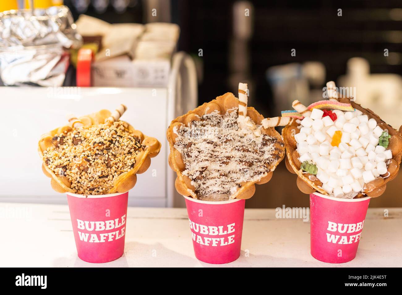 Different types of bubble waffle ice cream to go Stock Photo Alamy