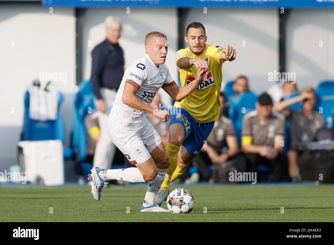 OHL's Casper De Norre and Westerlo's Edisson Jordanov fight for the